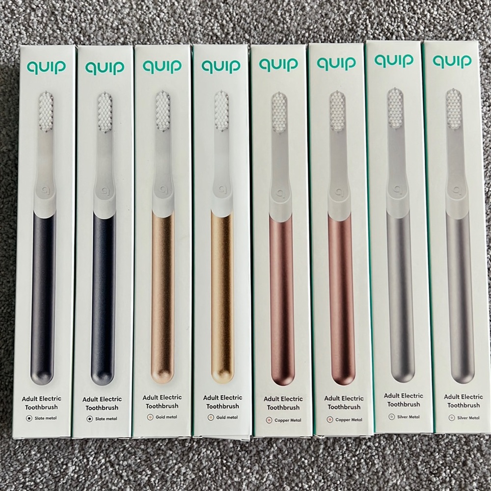 Quip adult metal electric toothbrush Bundle (8)New. Retail value $325